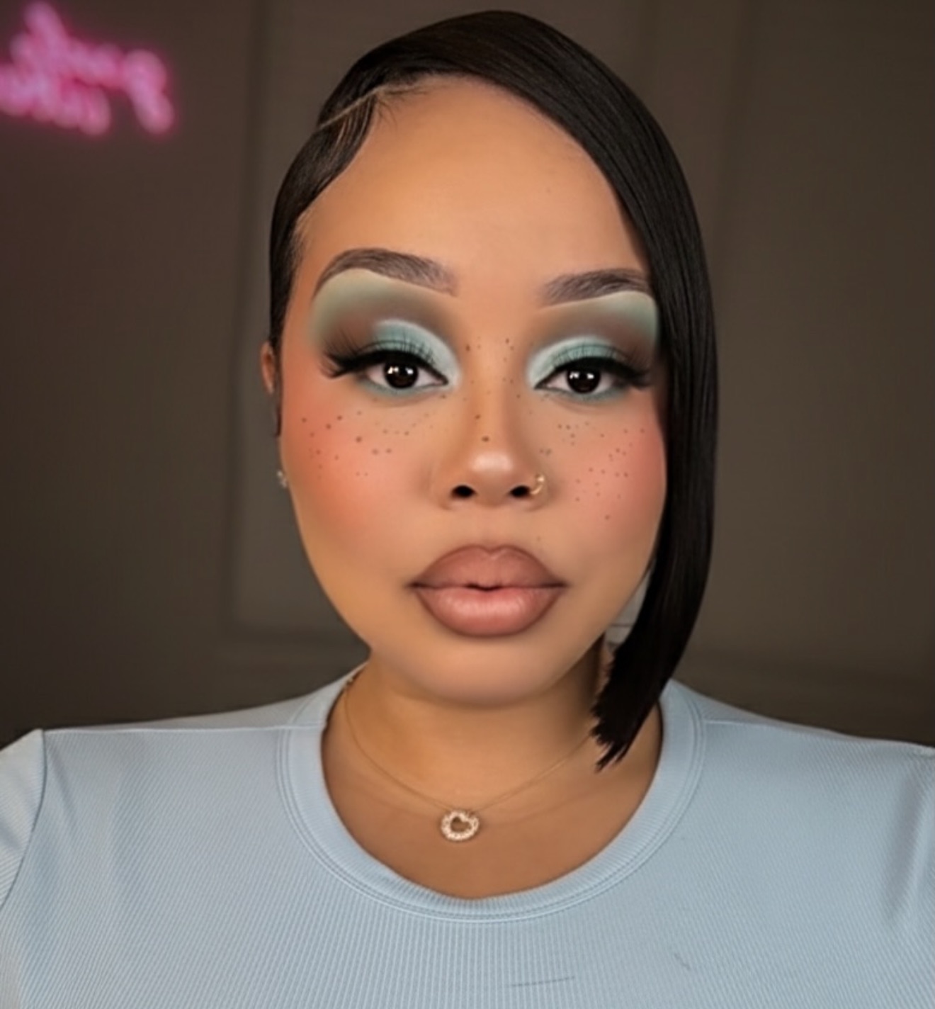 Editorial mint eyeshadow with freckles